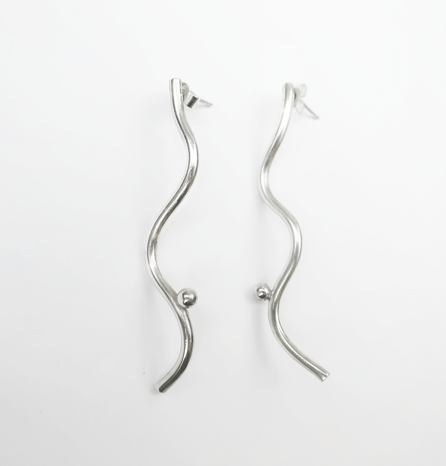 Bell Curve earrings - Filia Rex